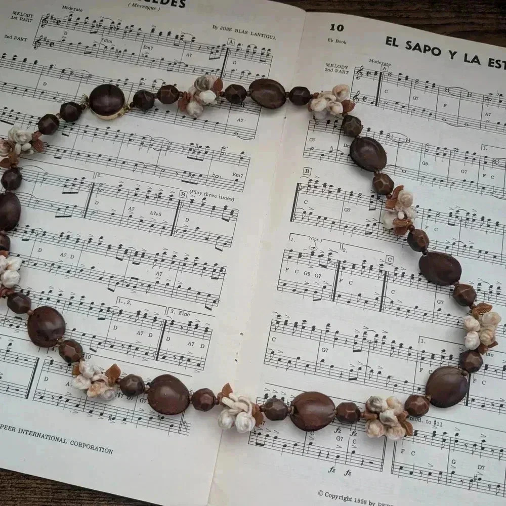 Brown Beaded Necklace With Carved Flower Beads